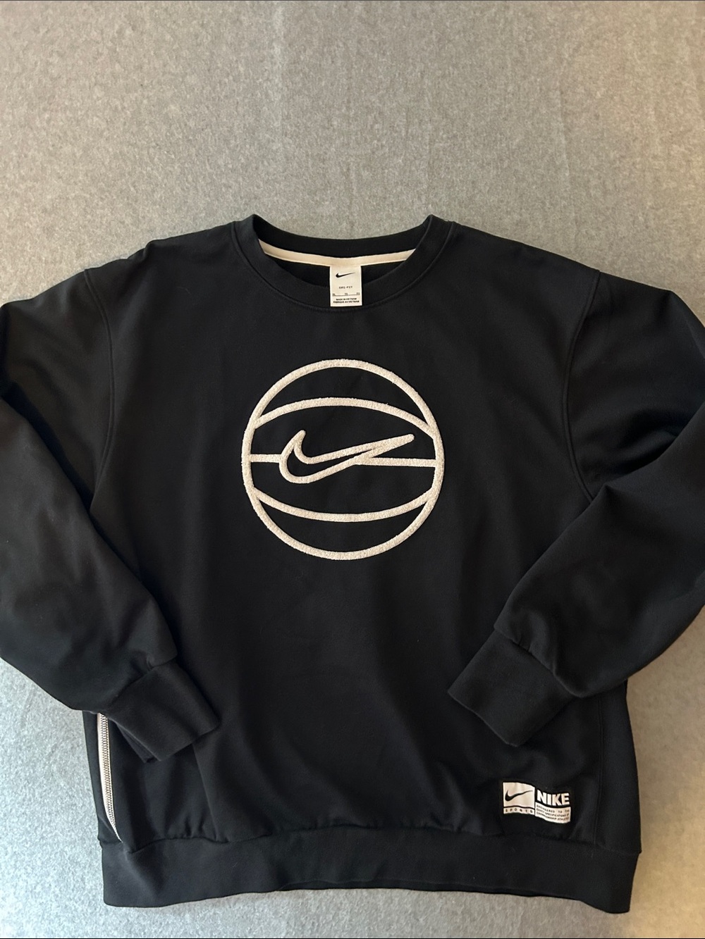 Nike Black Sweatshirt with White Swoosh Basketball Graphic